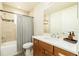 Clean bathroom with a bathtub, shower, and updated vanity at 3 Riverwalk Dr # 401, New Smyrna Beach, FL 32169