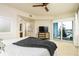 Main bedroom with balcony access and water views at 3 Riverwalk Dr # 401, New Smyrna Beach, FL 32169