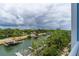 Stunning view of the canal and surrounding landscape from balcony at 3 Riverwalk Dr # 401, New Smyrna Beach, FL 32169