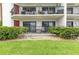 Two balconies with metal railings and lush greenery at 3001 S Atlantic Ave # 503, New Smyrna Beach, FL 32169