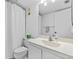 Clean bathroom with single sink and shower/tub combo at 3001 S Atlantic Ave # 503, New Smyrna Beach, FL 32169