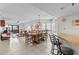 Dining room with table, chairs, and view into living room at 3001 S Atlantic Ave # 503, New Smyrna Beach, FL 32169