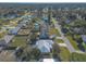 Aerial view of house and surrounding homes at 3015 Queen Palm Dr, Edgewater, FL 32141