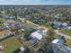 Wide aerial view of the house and neighborhood at 3015 Queen Palm Dr, Edgewater, FL 32141