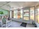 Bright and airy sunroom with view of backyard at 3015 Queen Palm Dr, Edgewater, FL 32141