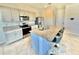 Modern kitchen with stainless steel appliances and granite countertops at 3035 Meleto Blvd, New Smyrna Beach, FL 32168