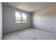 Spacious bedroom with large window, offering ample natural light at 3046 Isles Way, New Smyrna Beach, FL 32168