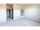 Unfurnished bedroom with access to other rooms and closets at 3046 Isles Way, New Smyrna Beach, FL 32168