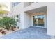 Modern home exterior with covered entryway and landscaping at 3046 Isles Way, New Smyrna Beach, FL 32168