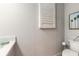 Clean bathroom with toilet and white shutters at 3066 Isles Way, New Smyrna Beach, FL 32168