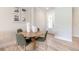 Small dining area with round table and four chairs at 3066 Isles Way, New Smyrna Beach, FL 32168