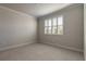 Bright bedroom with carpet flooring and window with shutters at 3067 Isles Way, New Smyrna Beach, FL 32168