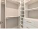 Walk-in closet with ample shelving and drawers at 3067 Isles Way, New Smyrna Beach, FL 32168