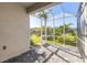 Relaxing screened porch with paver patio and lush landscaping at 3067 Isles Way, New Smyrna Beach, FL 32168