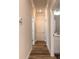 Bright hallway with light walls and wood-look flooring at 3088 Isles Way, New Smyrna Beach, FL 32168