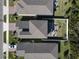 Aerial view of house and surrounding neighborhood at 3133 Crab Trap Dr, New Smyrna Beach, FL 32168