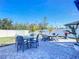 Outdoor patio area with fire pit and seating at 3133 Crab Trap Dr, New Smyrna Beach, FL 32168