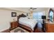 Main bedroom with ocean view, king bed, and hardwood floors at 3145 S Atlantic Ave # 804, Daytona Beach Shores, FL 32118