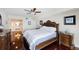 Main bedroom with ocean view, king bed, and hardwood floors at 3145 S Atlantic Ave # 804, Daytona Beach Shores, FL 32118