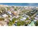 Aerial view showing home's proximity to the beach and town at 321 Jessamine Ave, New Smyrna Beach, FL 32169