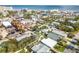 Aerial view of home near beach and local businesses at 321 Jessamine Ave, New Smyrna Beach, FL 32169