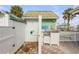 Private outdoor shower with stainless steel sink and storage at 321 Jessamine Ave, New Smyrna Beach, FL 32169