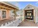 Back patio with access to a storage shed for golf cart at 321 Jessamine Ave, New Smyrna Beach, FL 32169