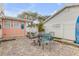 Relaxing patio with brick paving, outdoor seating, and lush greenery at 321 Jessamine Ave, New Smyrna Beach, FL 32169