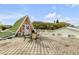 A-frame guest house and rooftop deck with seating area at 321 Jessamine Ave, New Smyrna Beach, FL 32169