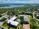 Aerial view of community, showing building and waterfront access at 3800 Saxon Dr # 39039C, New Smyrna Beach, FL 32169