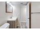 Bathroom with vanity, sink, and access to other rooms at 3800 Saxon Dr # 39039C, New Smyrna Beach, FL 32169