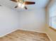 Bedroom with ceiling fan and window blinds at 3800 Saxon Dr # 39039C, New Smyrna Beach, FL 32169