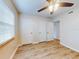 Bedroom with double closets and ceiling fan at 3800 Saxon Dr # 39039C, New Smyrna Beach, FL 32169