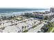 Aerial view of condo complex, beach, and parking area at 3801 S Atlantic Ave # 304, New Smyrna Beach, FL 32169