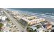 Aerial perspective of beachfront condo, highlighting its location at 3801 S Atlantic Ave # 304, New Smyrna Beach, FL 32169