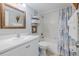 Clean bathroom with a shower/tub combo and white vanity at 3801 S Atlantic Ave # 304, New Smyrna Beach, FL 32169