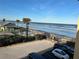 Direct beach access with parking and picnic tables at 3801 S Atlantic Ave # 304, New Smyrna Beach, FL 32169