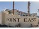 Point East condo building sign, welcoming guests to the property at 3801 S Atlantic Ave # 304, New Smyrna Beach, FL 32169