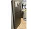 Stainless steel refrigerator in the kitchen at 3801 S Atlantic Ave # 304, New Smyrna Beach, FL 32169