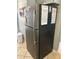 Stainless steel refrigerator in kitchen at 3801 S Atlantic Ave # 304, New Smyrna Beach, FL 32169