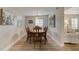 Traditional dining room featuring a wood table with chairs and a modern pendant light overhead at 388 N Glencoe Rd, New Smyrna Beach, FL 32168