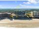 Oceanfront condo building with beach access, pool, and surrounding coastal views at 4139 S Atlantic Ave # A307, New Smyrna Beach, FL 32169