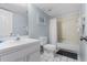 Bathroom with tub, toilet and vanity at 4139 S Atlantic Ave # A307, New Smyrna Beach, FL 32169