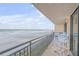 Relaxing oceanfront balcony with comfortable seating at 4139 S Atlantic Ave # A307, New Smyrna Beach, FL 32169