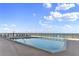 Inviting outdoor pool with ocean views at 4139 S Atlantic Ave # A307, New Smyrna Beach, FL 32169