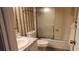 Clean bathroom with shower/tub combo and updated vanity at 4155 S Atlantic Ave # 5090, New Smyrna Beach, FL 32169