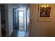 Bright entryway with open door revealing ocean view at 4155 S Atlantic Ave # 5090, New Smyrna Beach, FL 32169