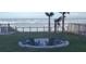 Oceanfront fire pit with seating area at 4155 S Atlantic Ave # 5090, New Smyrna Beach, FL 32169