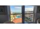 Stunning ocean and pool view from window at 4155 S Atlantic Ave # 5090, New Smyrna Beach, FL 32169