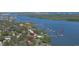 Bird's eye view of waterfront property and community at 417 N Riverside Dr, Edgewater, FL 32132